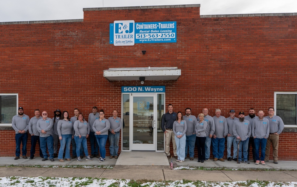 The E&J Container team standing together in front of the 500 N. Wayne Cincinnati office, representing our locally owned and family-operated staff.
